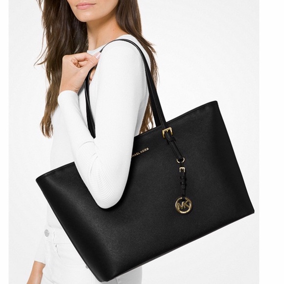 Michael Kors Handbags - Michael Kors Jet Set medium top zip bag. NWOT